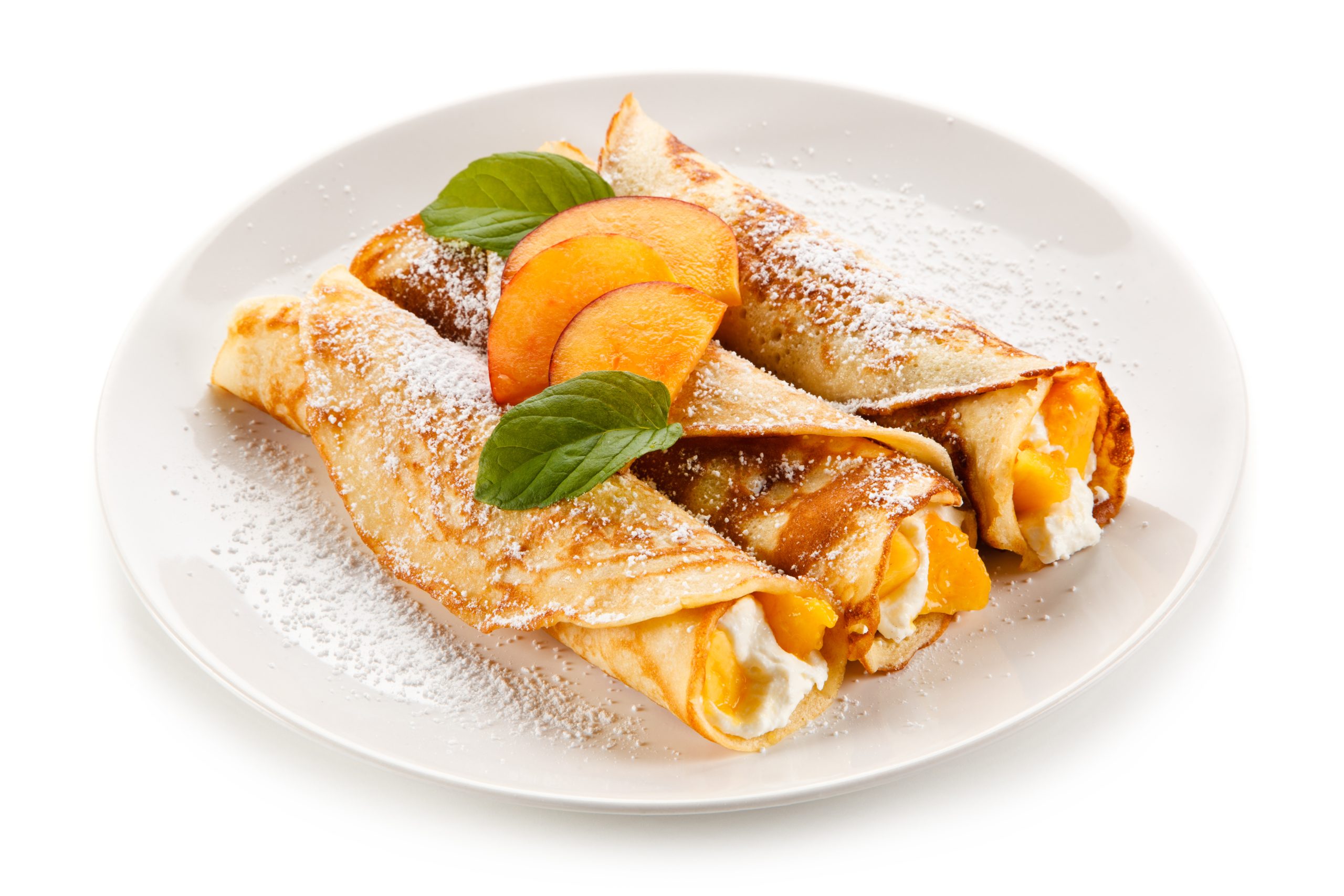 Crepes con pesche e gelato